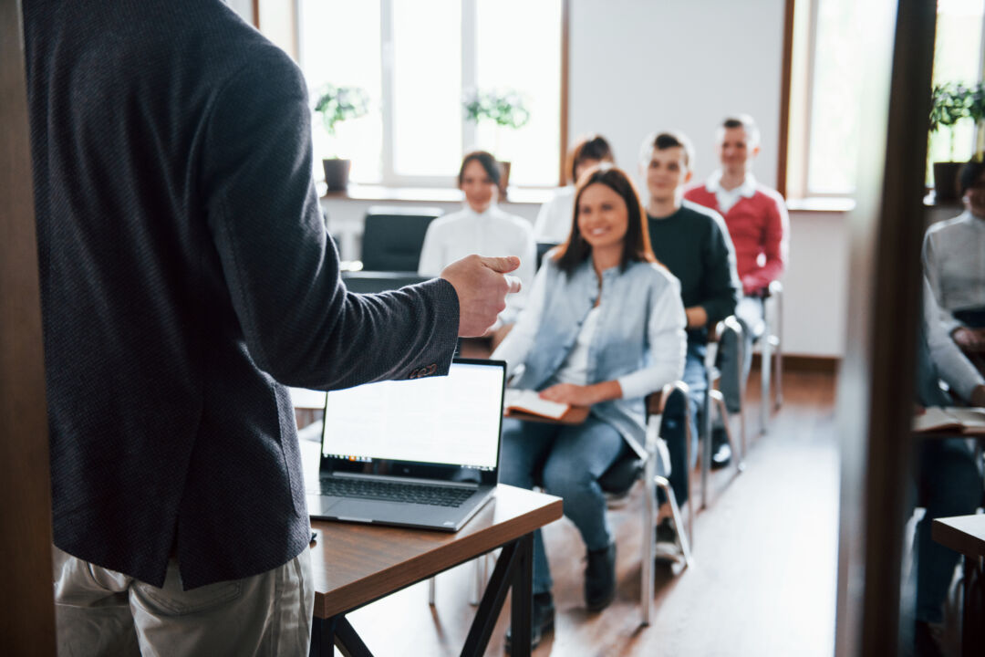 Cheerful mood Group of people at business conference in modern classroom at daytime