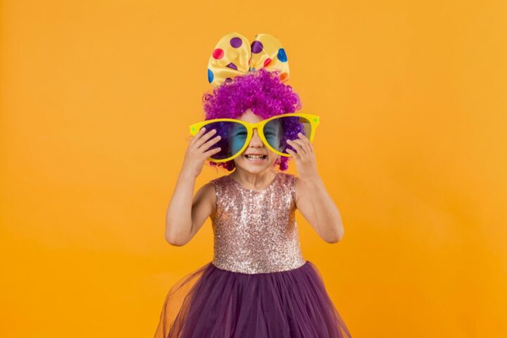 little girl with big sunglasses tutu