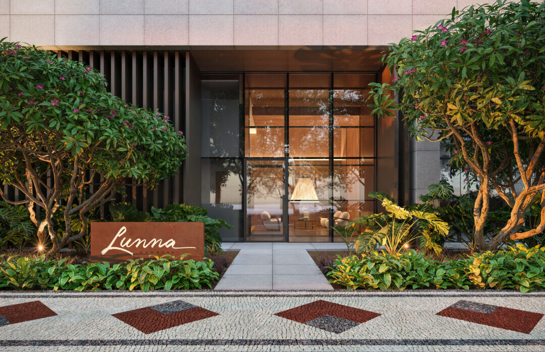 Lunna Savassi: entrada de novo residencial de alto padrão em Belo Horizonte Entrada do empreendimento Lunna Savassi, residencial de alto padrão com fachada moderna e paisagismo em Belo Horizonte