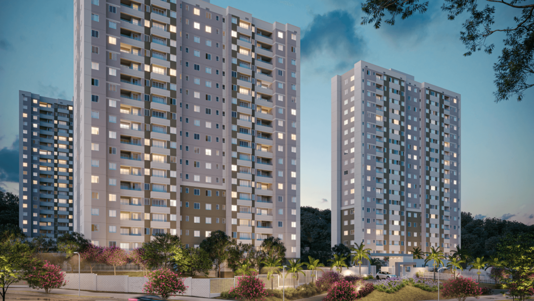 Empreendimento residencial do Grupo Direcional com torres de apartamentos iluminadas, representando expansão da construtora no mercado imobiliário